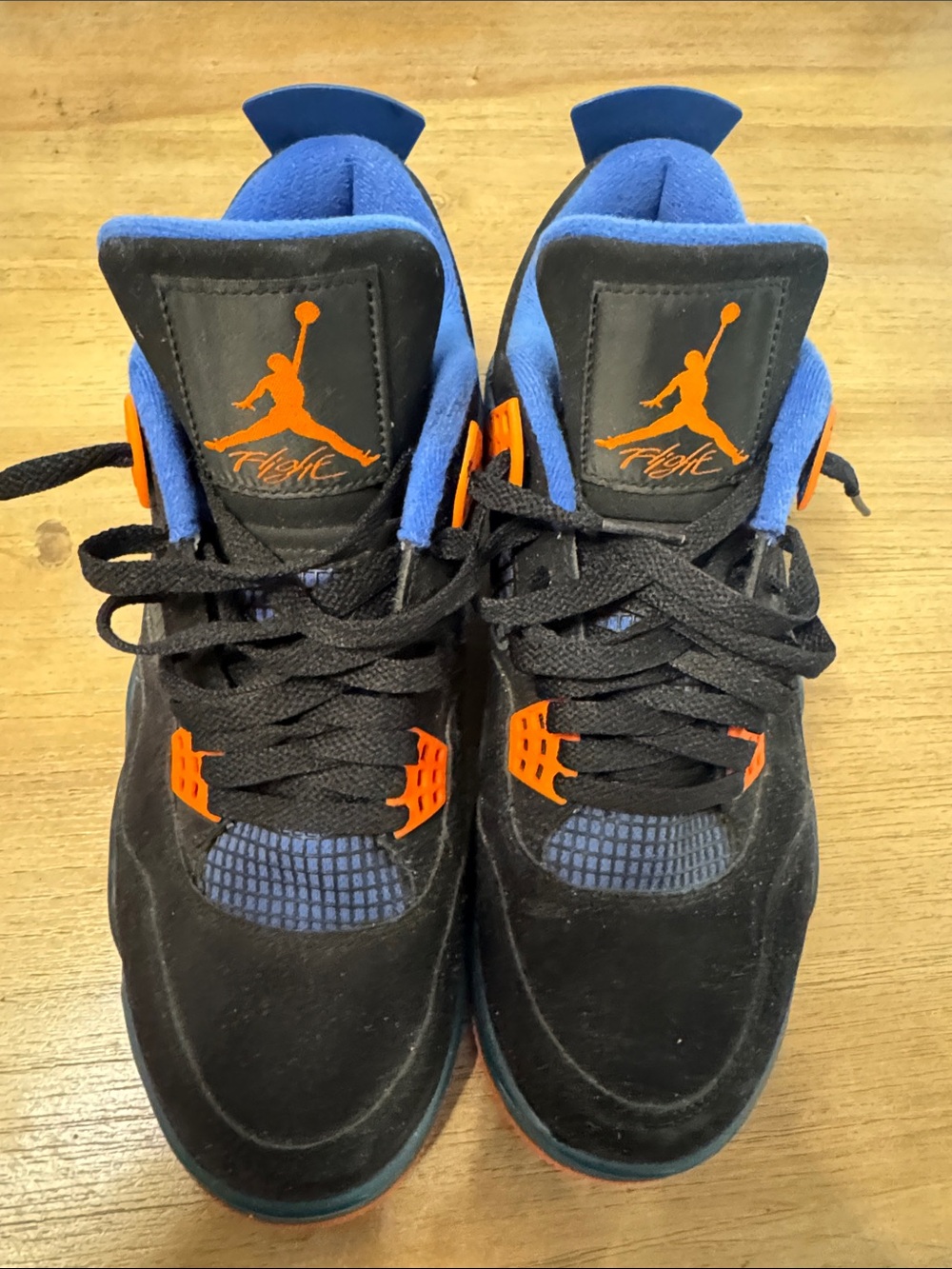 Retro Four Cavalier / Knicks Jordans Black & Blue Sneakers with Orange Accent